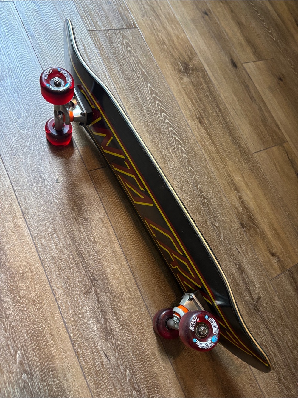 Santa Cruz Skateboards Black Deck with Red Wheels